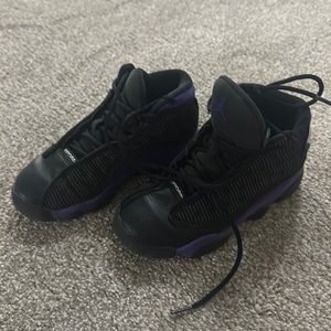 Black and purple kids Jordan shoes